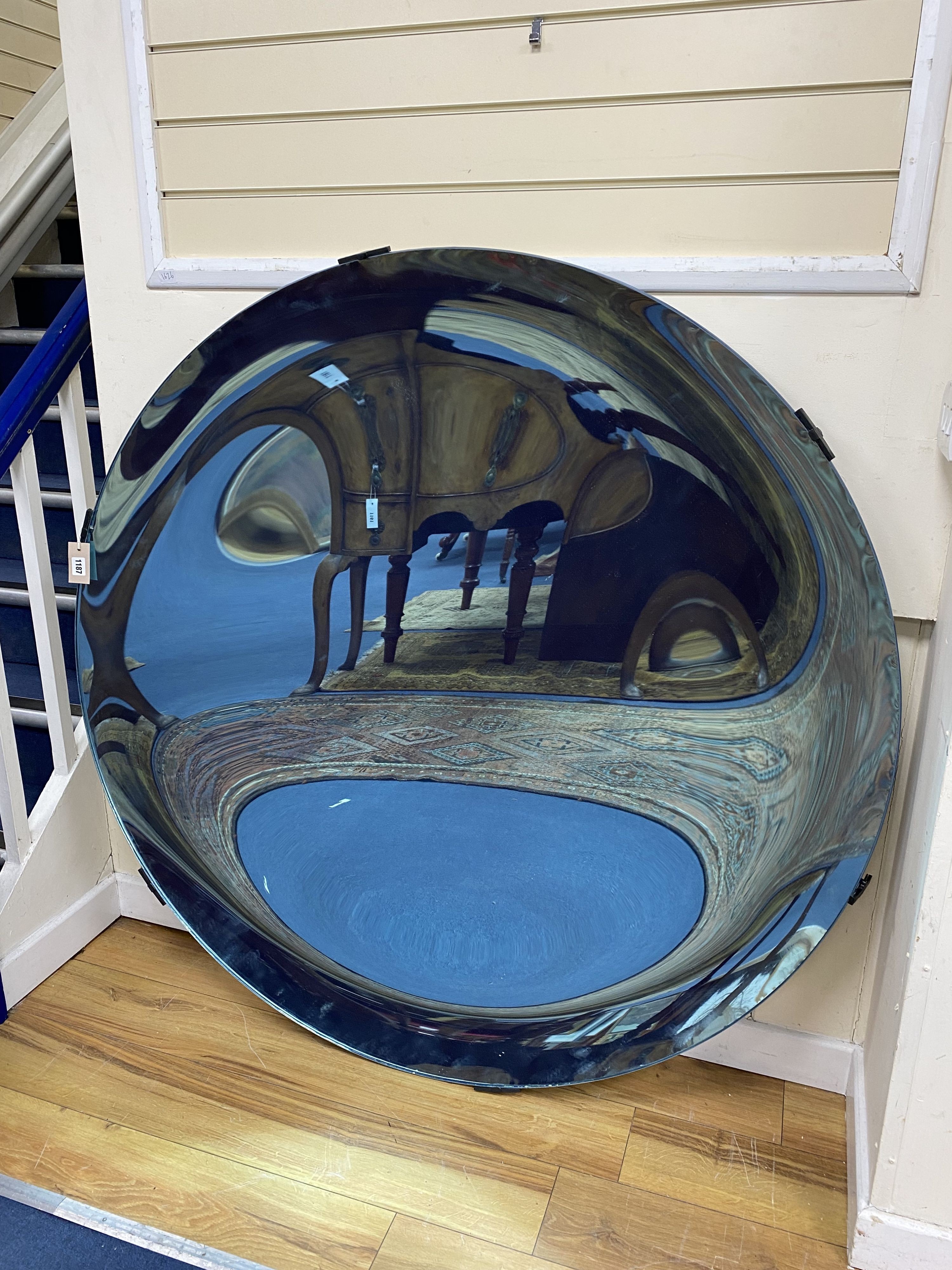 An Anish Kapoor style blue domed / concave mirror, Made by The Glass House, Tunbridge Wells. 135cm diameter